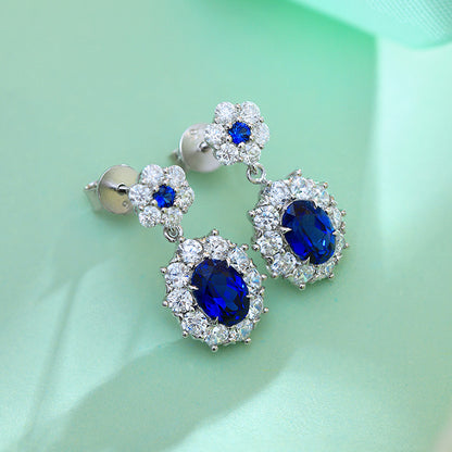 2.09 CTW Oval Lab Grown Sapphire S925 Earrings plated