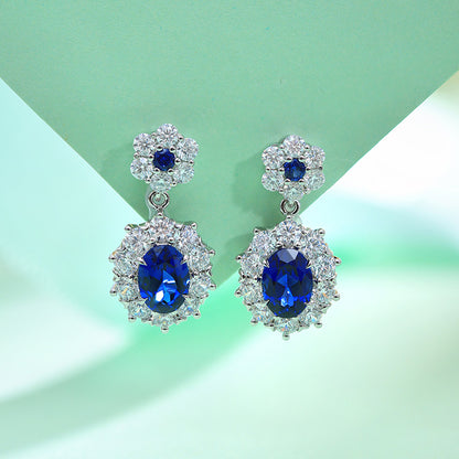 2.09 CTW Oval Lab Grown Sapphire S925 Earrings plated