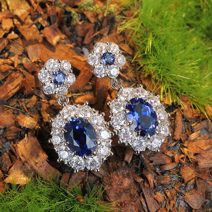 2.09 CTW Oval Lab Grown Sapphire S925 Earrings plated